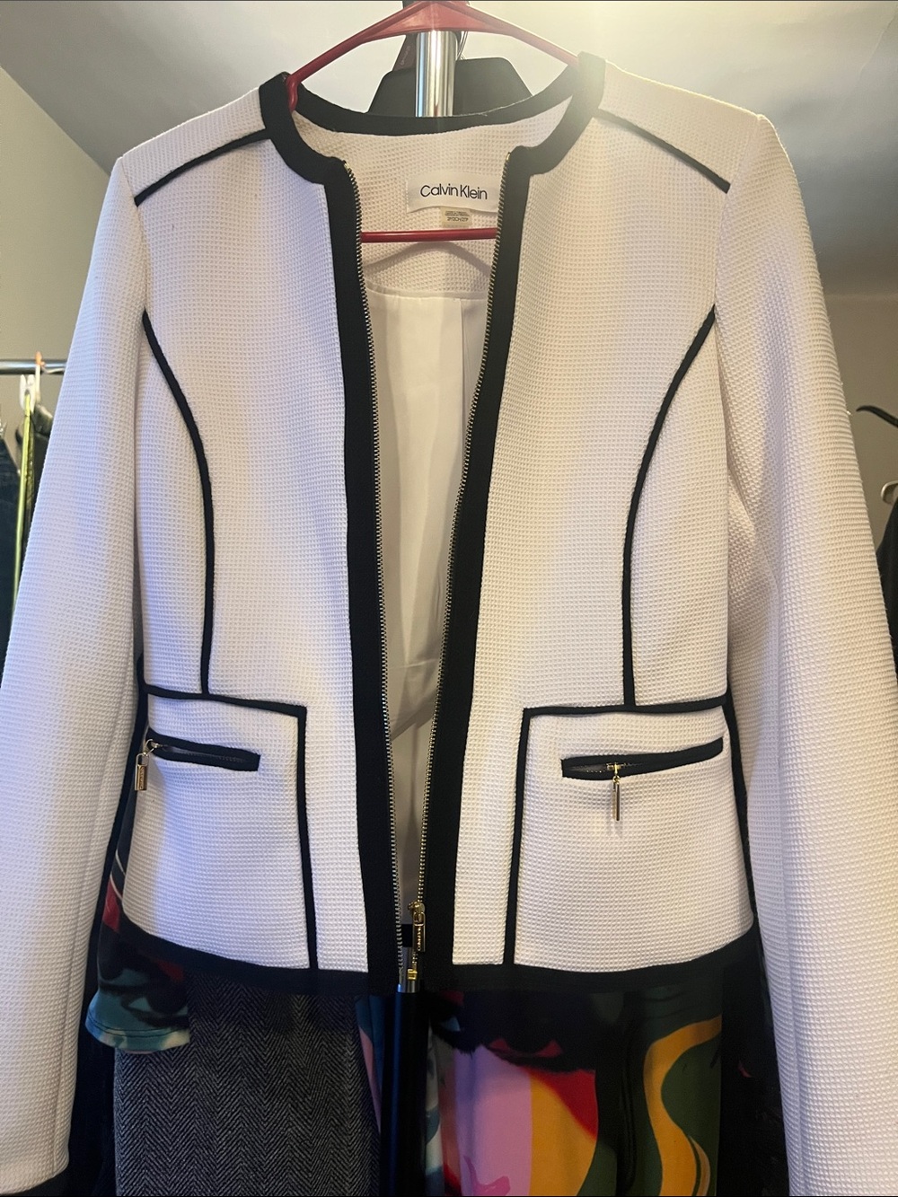 Calvin Klein White Textured Open-Front Jacket with Black Piping and gold zippers
